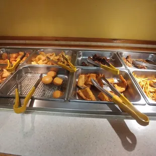 The brown table was full of crispy deliciousness. I recommend the crab Rangoon.