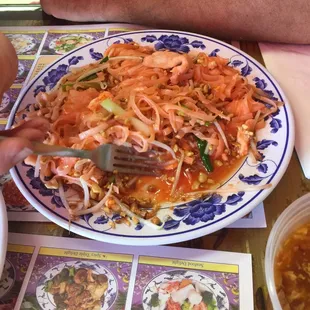 a person eating a plate of food