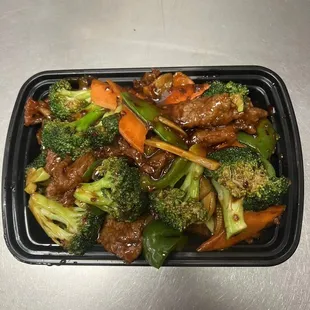beef and broccoli in a stir fry
