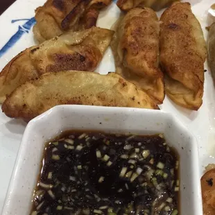 Fried dumplings with dipping sauce