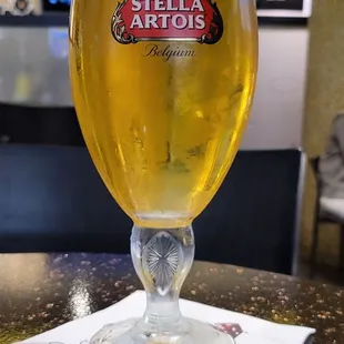 a glass of stella artois