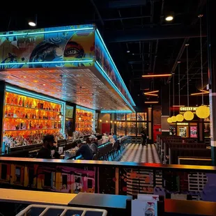 The fully stocked bar, don&apos;t skip the mango margarita