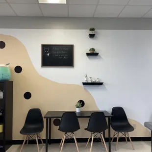  table and chairs in a coffee shop