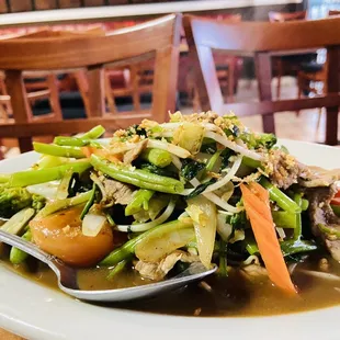 a plate of stir fried vegetables