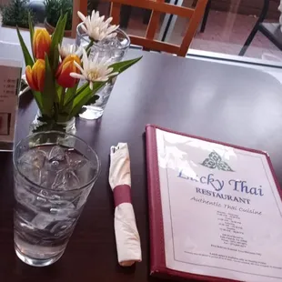 Table with small bouquet of fresh flowers.