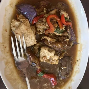 Half eaten Pad Ma Klur Lunch! With eggplant and chicken. So delicious!