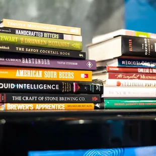 a stack of books on a shelf