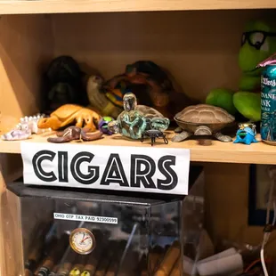 cigars and cigars in a display case
