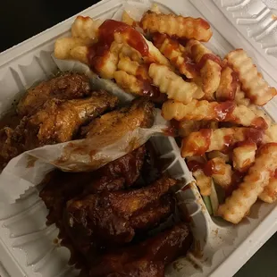 Lemon pepper and honey bbq wings combo (comes with fries, celery sticks and soda)