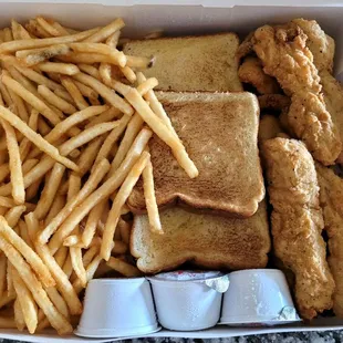 Inside the box. Fries, garlic toast, tenders, steak fingers and fried shrimp. Also sauce.