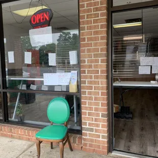 two green chairs outside