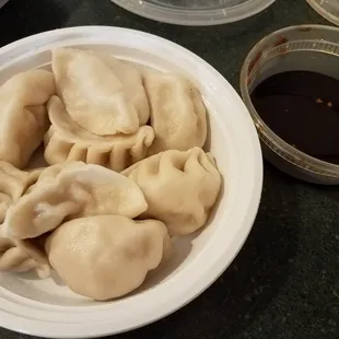 Boiled dumplings - boiled is NOT the way to go.  Get them FRIED!