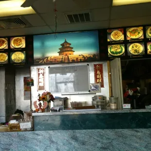 a view of a restaurant counter