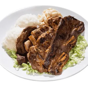 A wonderful mixed bbq grill plate with rice and macaroni