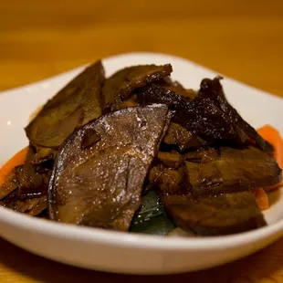 a white bowl filled with food