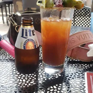 a drink and a bottle of beer