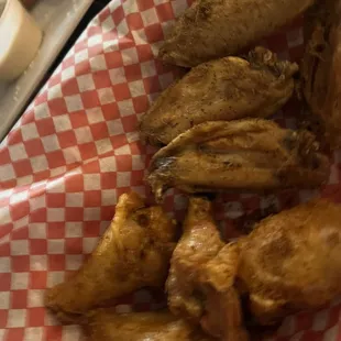 a basket of fried wings