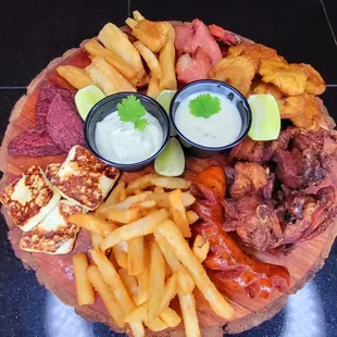 French fries, fries, yuca, sausage, fry cheese, chicken, smoked pork chop, and more