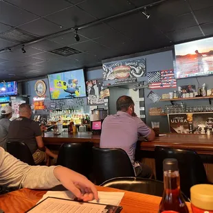 a man sitting at a bar