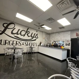 Lucky&apos;s! Dining area. Easy to read menu. Homemade sauces, charbroiled burgers. Can&apos;t lose.