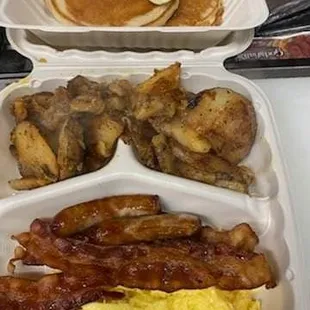 Bacon, eggs, homefries, and pancakes