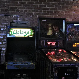 a row of pinball machines