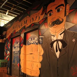 a mural of a man in a suit