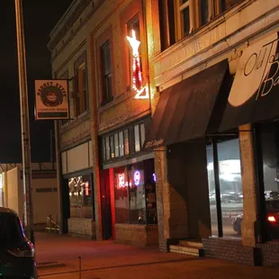 a car parked in front of a restaurant