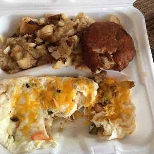 Veggie Omelette Platter with home fries and I added on a salmon cake. BOMB!!