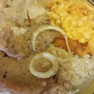 Smothered pork chops, cabbage and Macaroni &amp; Cheese.