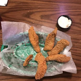 fried chicken wings in a basket