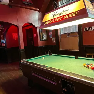 a pool table in a pub
