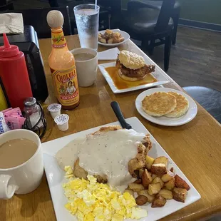 Chicken fried steak with cream gravy, fresh potatoes, scrambled eggs, coffee hot honey chicken sandwich