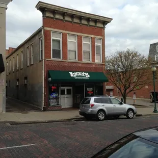 a car parked in front of it