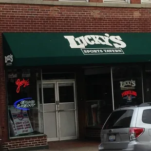 a car parked in front of the restaurant