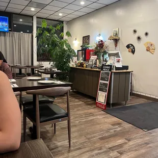 a woman sitting at a table