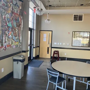 a table and chairs in a restaurant