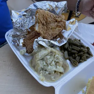 Catfish fried potatoes and green beans Fresh cornbread and white bread also served with meal