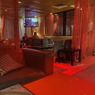 lounge area with red lighting