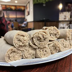 a plate of burritos