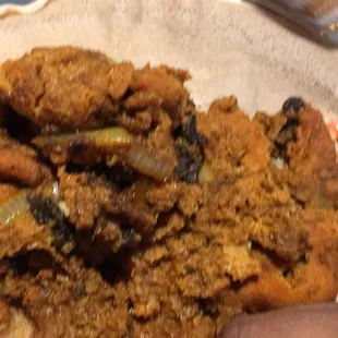this is Kuanta firfir, i.e. dried beef mixed with injera and tomato sauce with spice in it. So tasty. Yum Yum