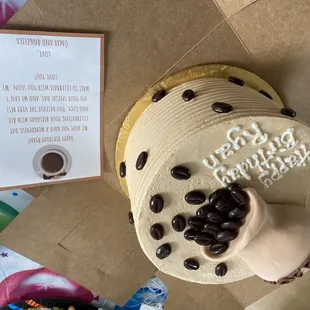 a cake with coffee beans on it