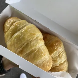 two croissants in a box
