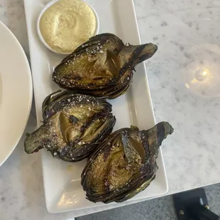 Buttered grilled artichokes