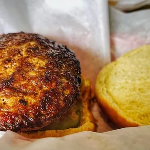 a cheeseburger in a basket