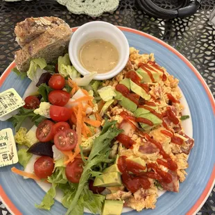 Sriracha avocado egg scramble with vegan bacon . Fantastic!