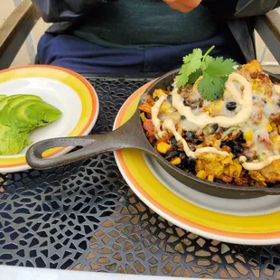 Southwestern skillet with sife of advocado