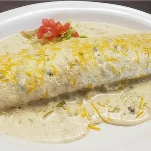 Lucy&apos;s burrito with ground beef, jalapeno, tomato and their amazing white sauce