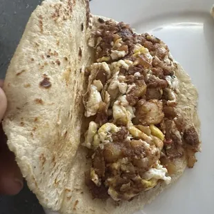 Chorizo, potatoes and egg taco with corn tortilla!