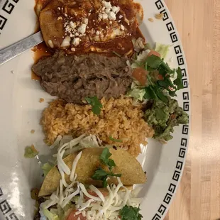 Taco, enchiladas, rice and beans